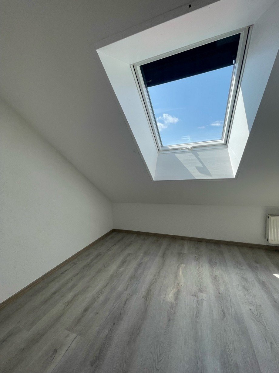 Zimmer DG Etagenwohnung Bischofsheim