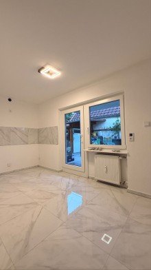 K�chenbereich und T�r zur Terasse Verf�gbar ab 01.05.2026 - 3 Zimmerwohnung - Souterrain