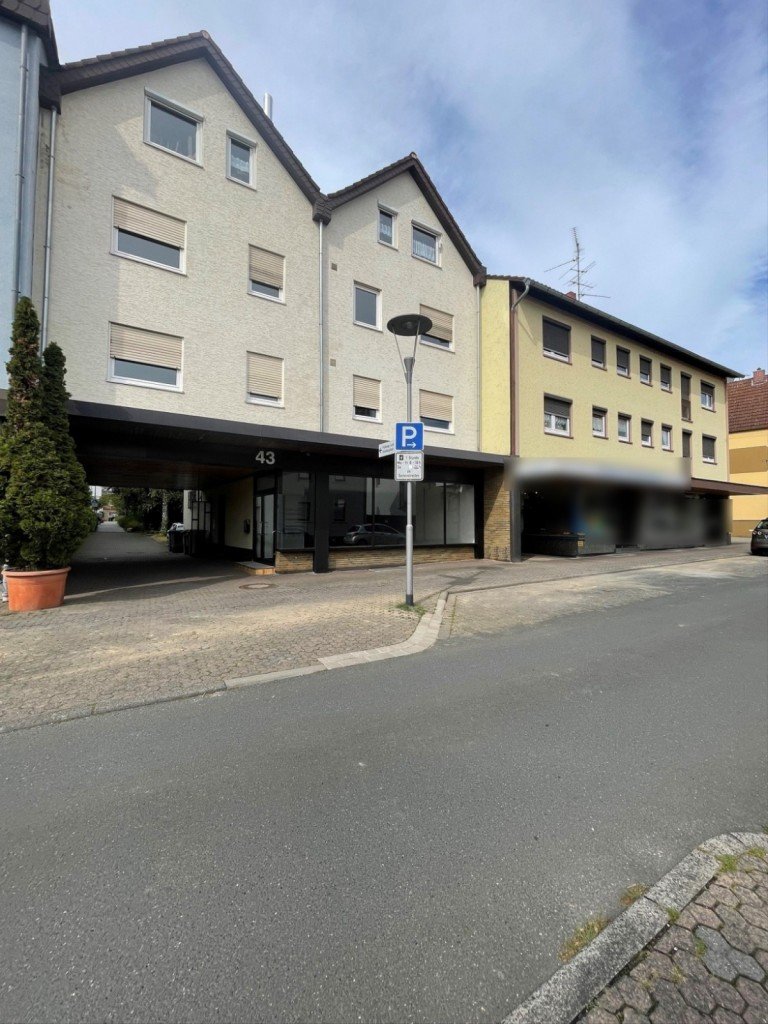 Hausansicht Hattersheim am Main Mehrfamilienhaus Attraktives Mehrfamilienhaus mit stabilem Mietertrag und Entwicklungspotenzial in Hattersheim